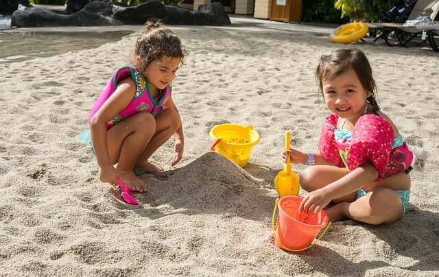 kids playing beach sand